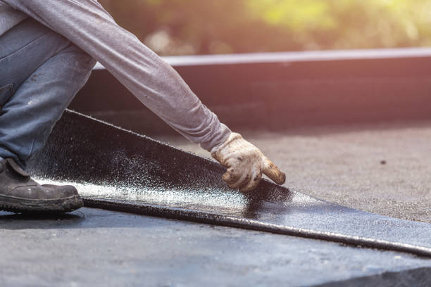 Professional Waterproofing technician working in Derby, OH
